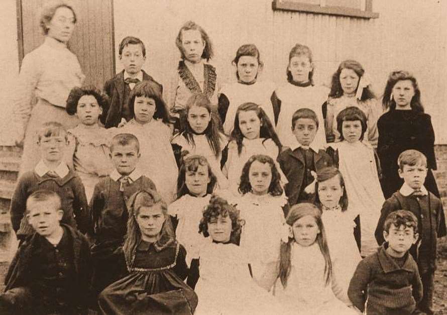 Girls and boys are pictured for official class shot