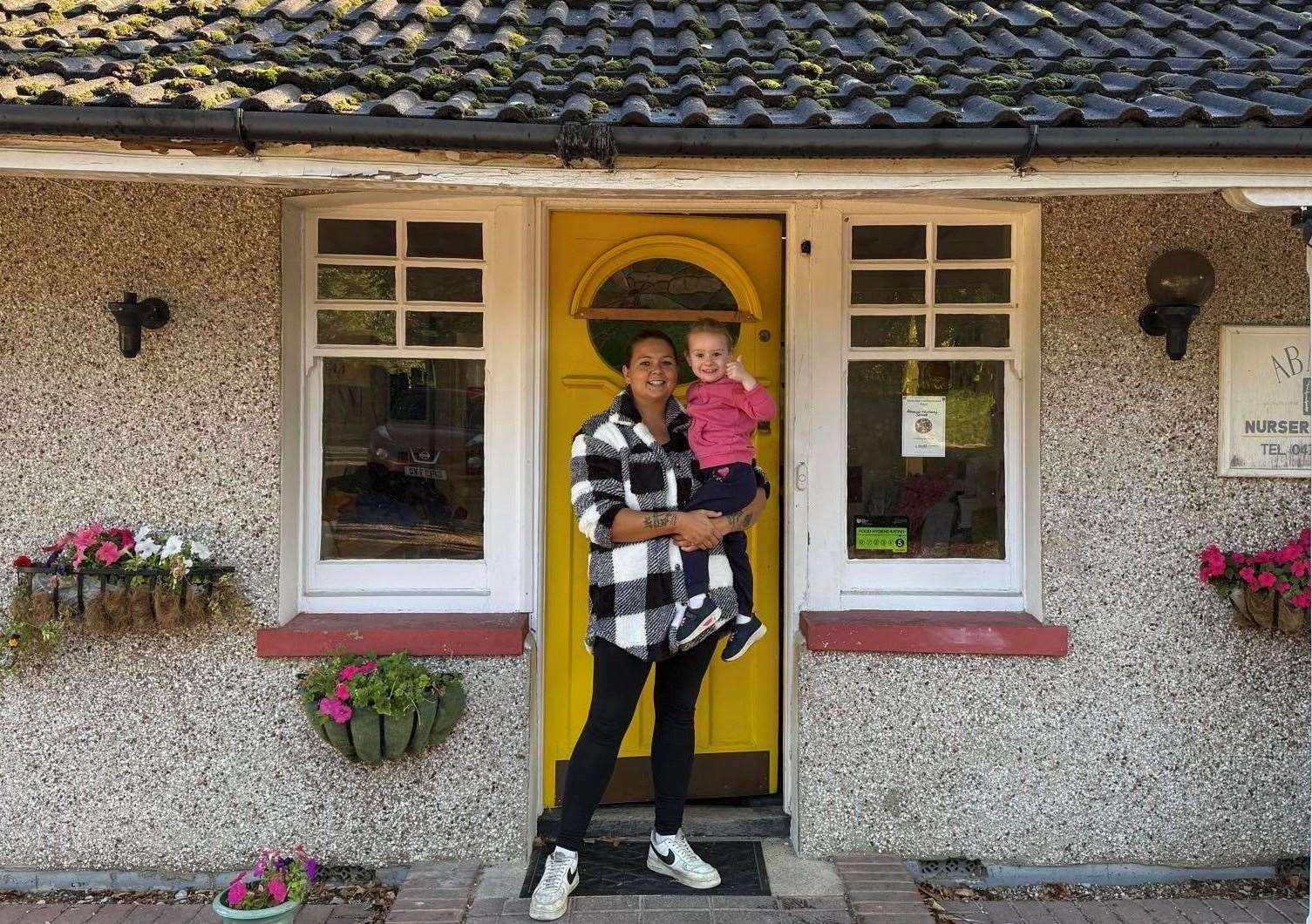 Bella Chapman outside Abacus Nursery with acting manager Emma Friend. Picture: Angela Chapman