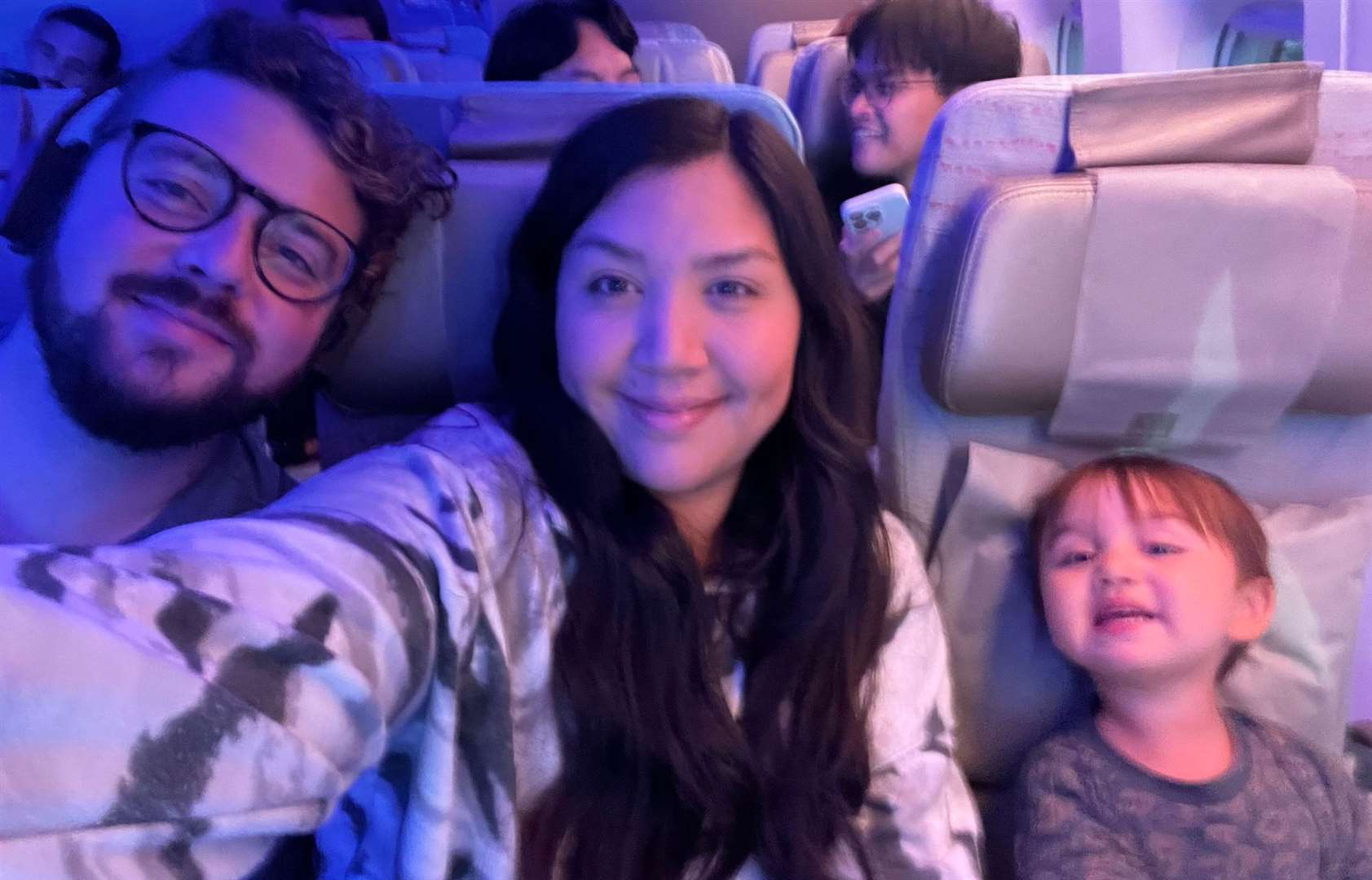 From left to right: Jack Mcloughlin, wife Diana Auria, and their four-year-old son have made the move to Manila in the Philippines after growing concerns over life in the UK. Picture: SWNS