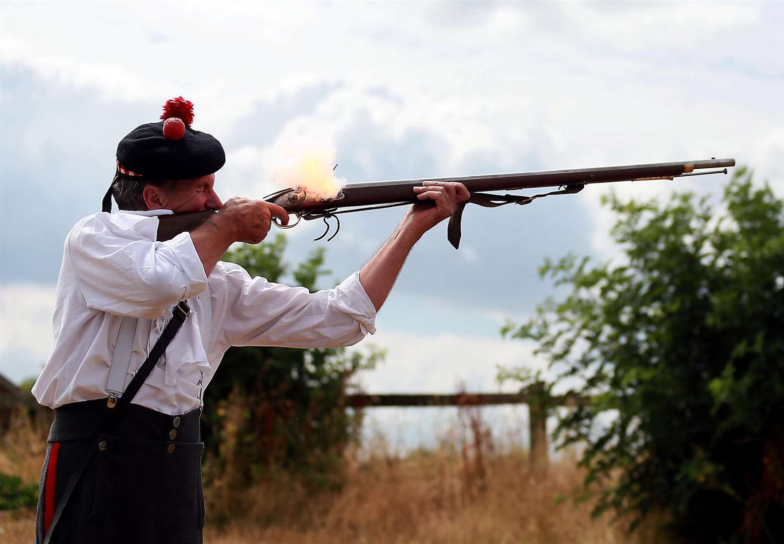 Glen Robinson demonstrates how a Napoleonic solider fires a musket. Picture: Phil Lee