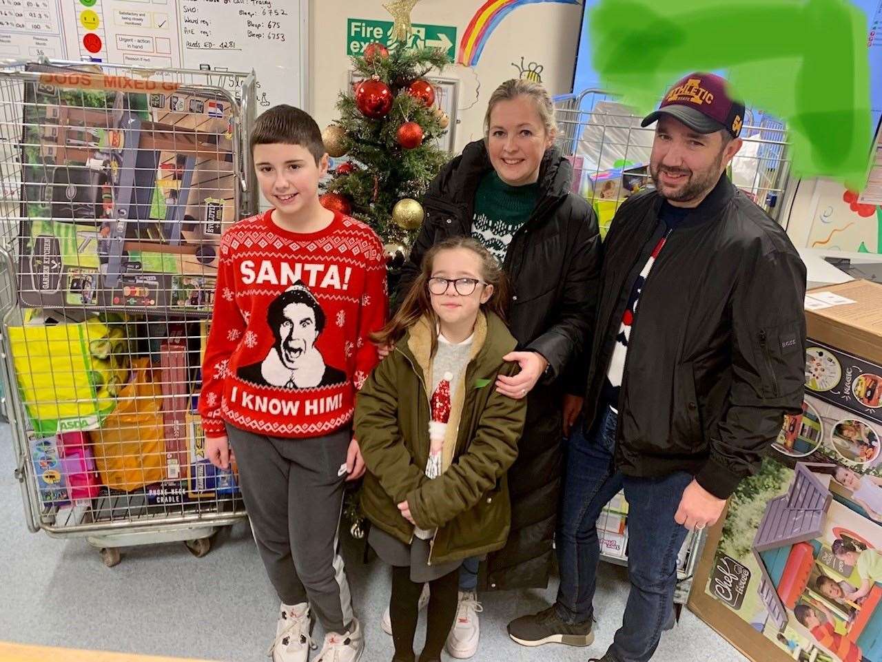 Betsy Boardman and her family delivering the gifts to the children's ward at the QEQM in Margate