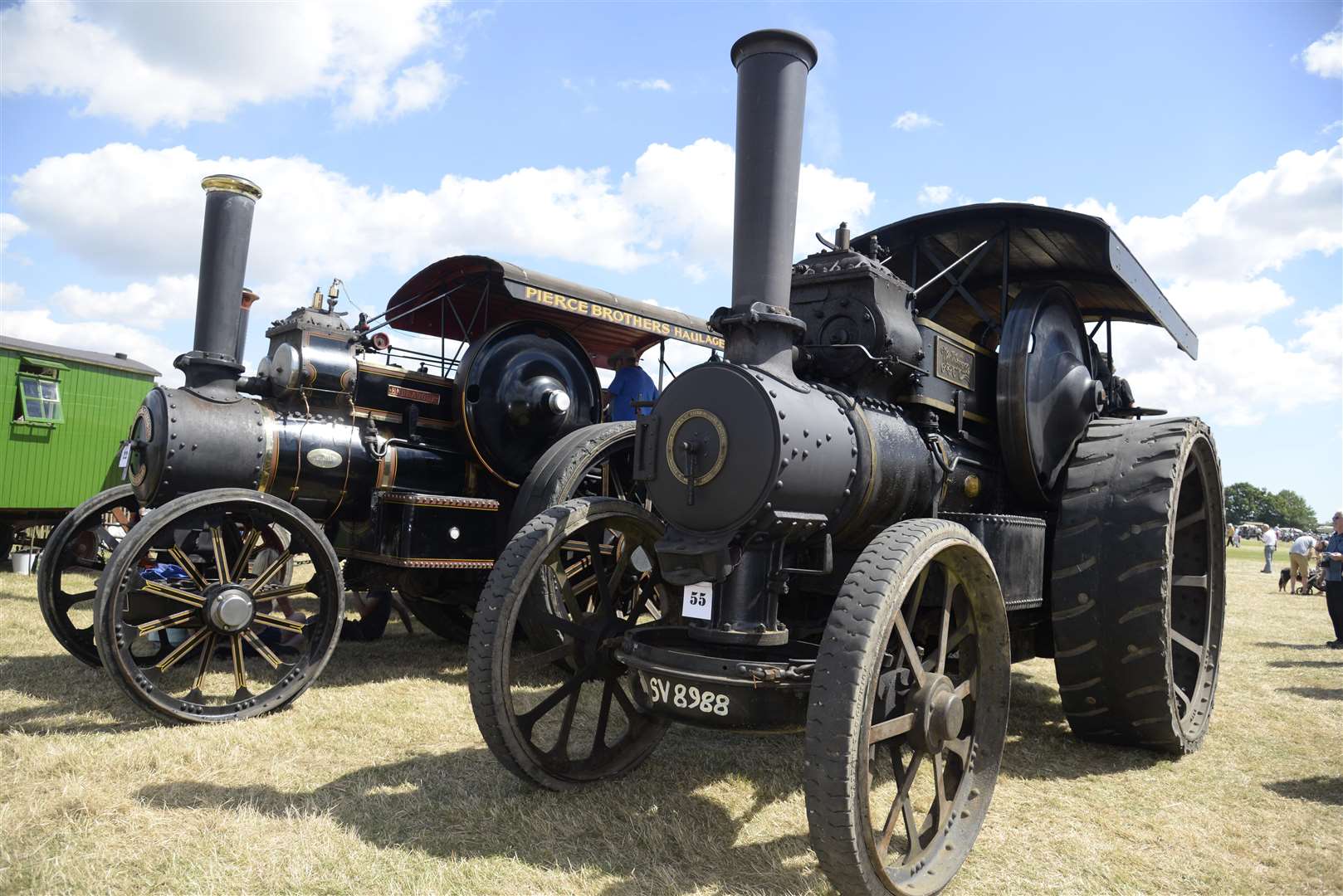 Two of the many traction engines at the Weald of Kent Steam Rally at Little Engeham Farm, Woodchurch