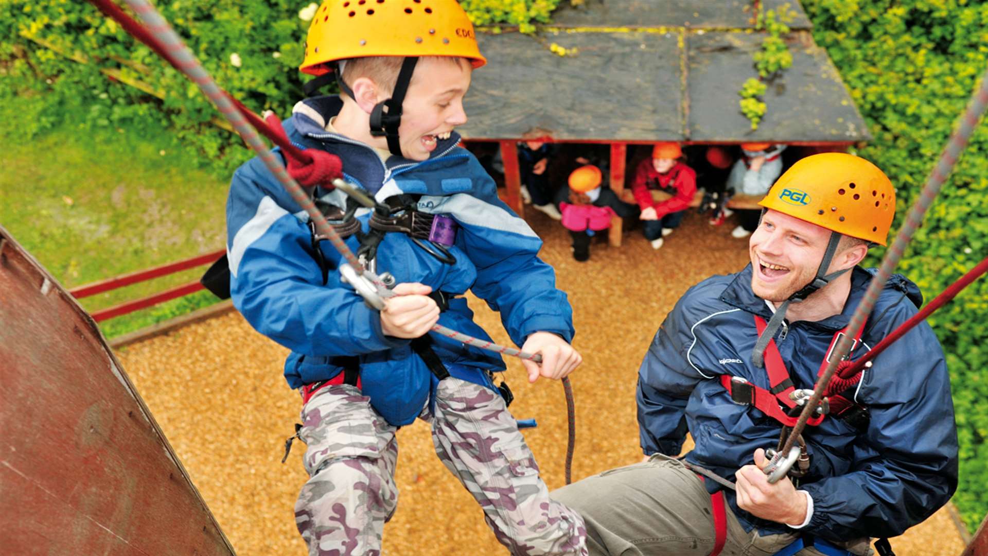 Having a go at the abseiling