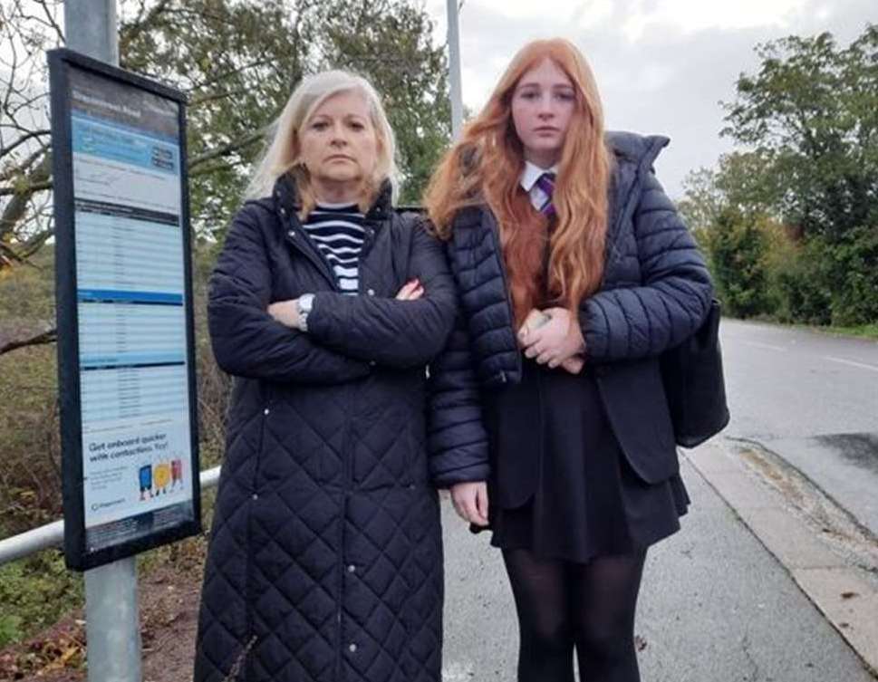 Linsey Hall, pictured with daughter Lara, says she might organise a private minibus to take children from Boughton-under-Blean to school if the cost of the Kent Travel Saver goes up